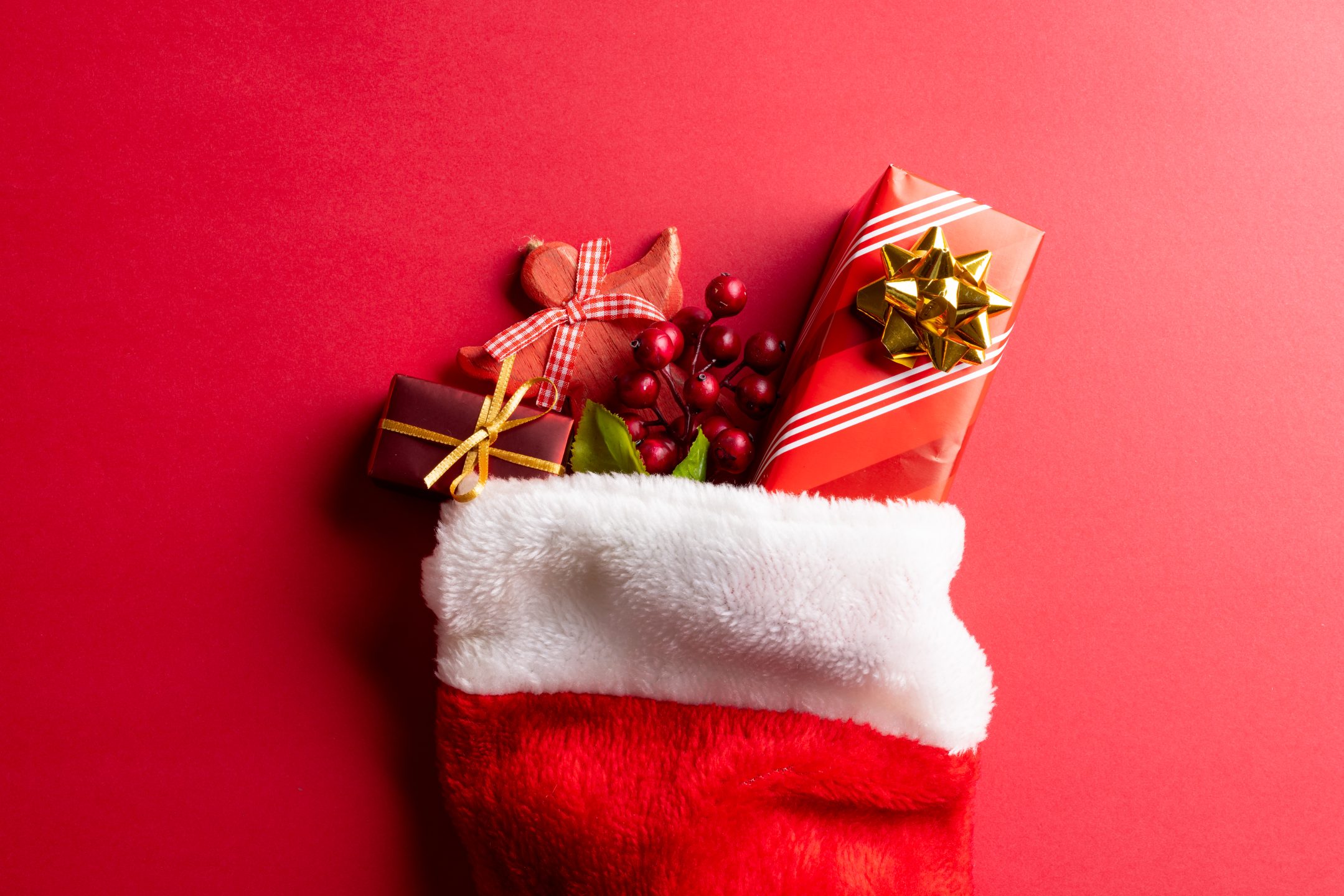 Photo of Christmas stocking full of presents